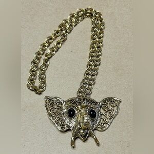 Vintage pendant elephant gold tone chain. 22” long. Unsigned D&E Juliana.